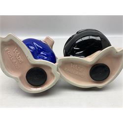 Set of five Wade NatWest money boxes, comprising father, mother, boy, girl and baby, four with original boxes 