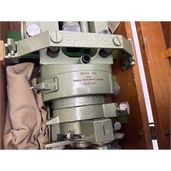 Vickers Instruments England Cooke V22 surveyor's theodolite, No.V.221387, with green enamelled body H32cm; in fitted wooden carrying box with retaining bar and repair label dated 3/8/77.