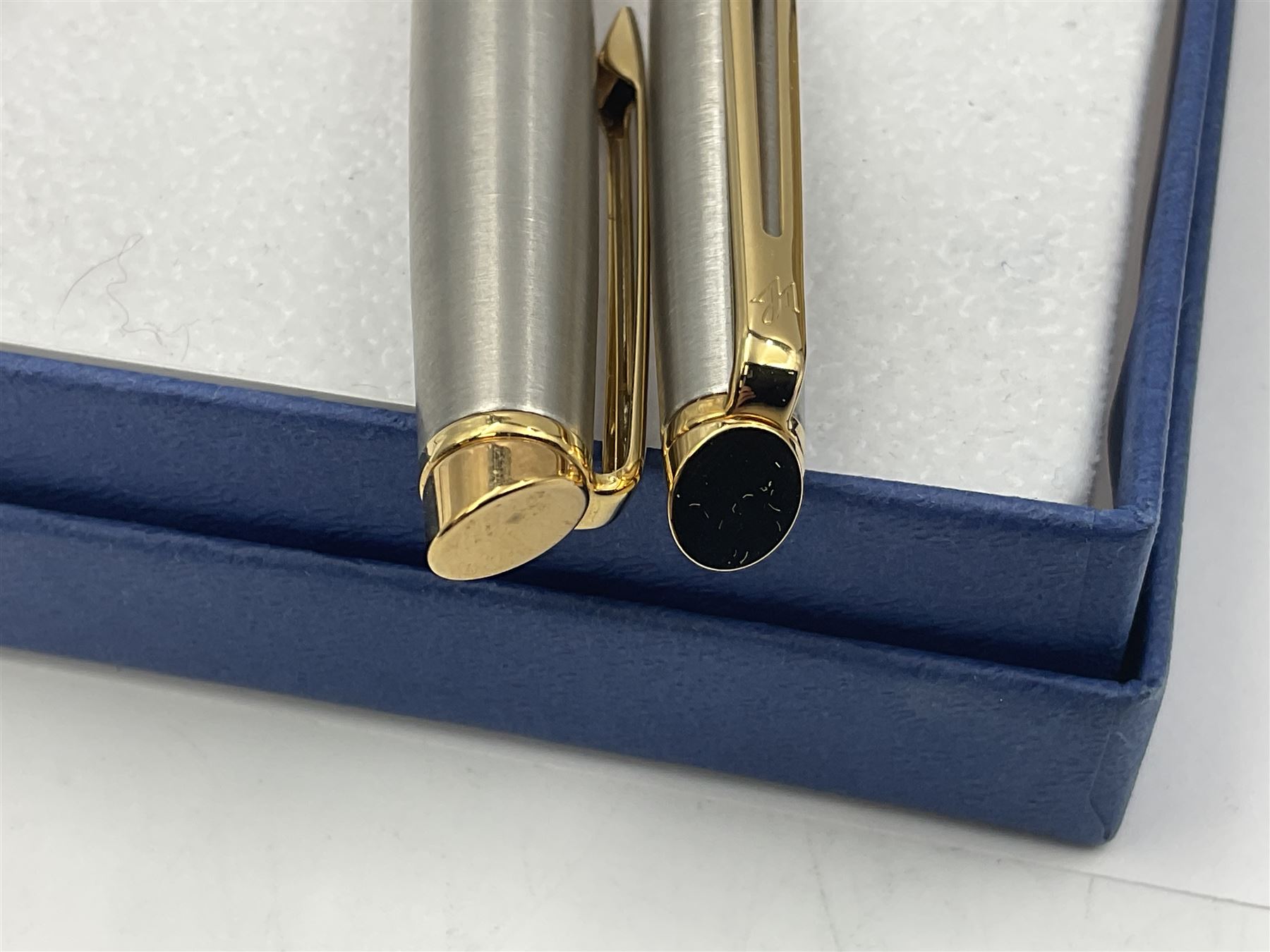 Group of Waterman pens and propelling pencils, to include a fountain pen, the black barrel with rolled gold cap and nib stamped 14ct, together with a matching propelling pencil, in box, together with a further fountain pen with gold nib stamped 14ct, stainless steel fountain pen and rollerball set in box, propelling pencil with maroon barrel etc, largest L13cm (7)