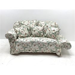 Early 20th century two seat settee with drop arm, upholstered in Sanderson 'Absalon Minor' fabric, loose covers and cushions, white ground with overall floral design