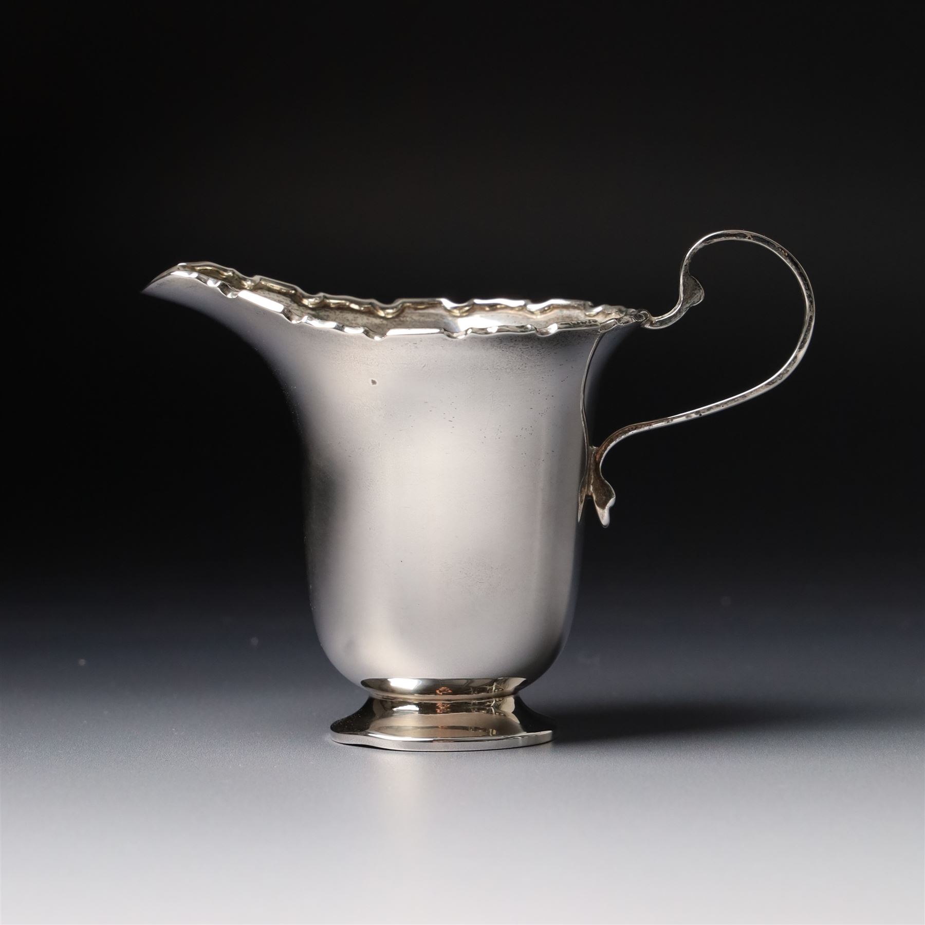 Silver sugar bowl and matching cream jug with crimped rims Birmingham 1938 Maker Adie Bros.
