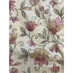 Pair lined curtains, in pale ground fabric with scrolling design decorated with flowers in pink, pleated headers, width at header -150cm, fall - 200cm