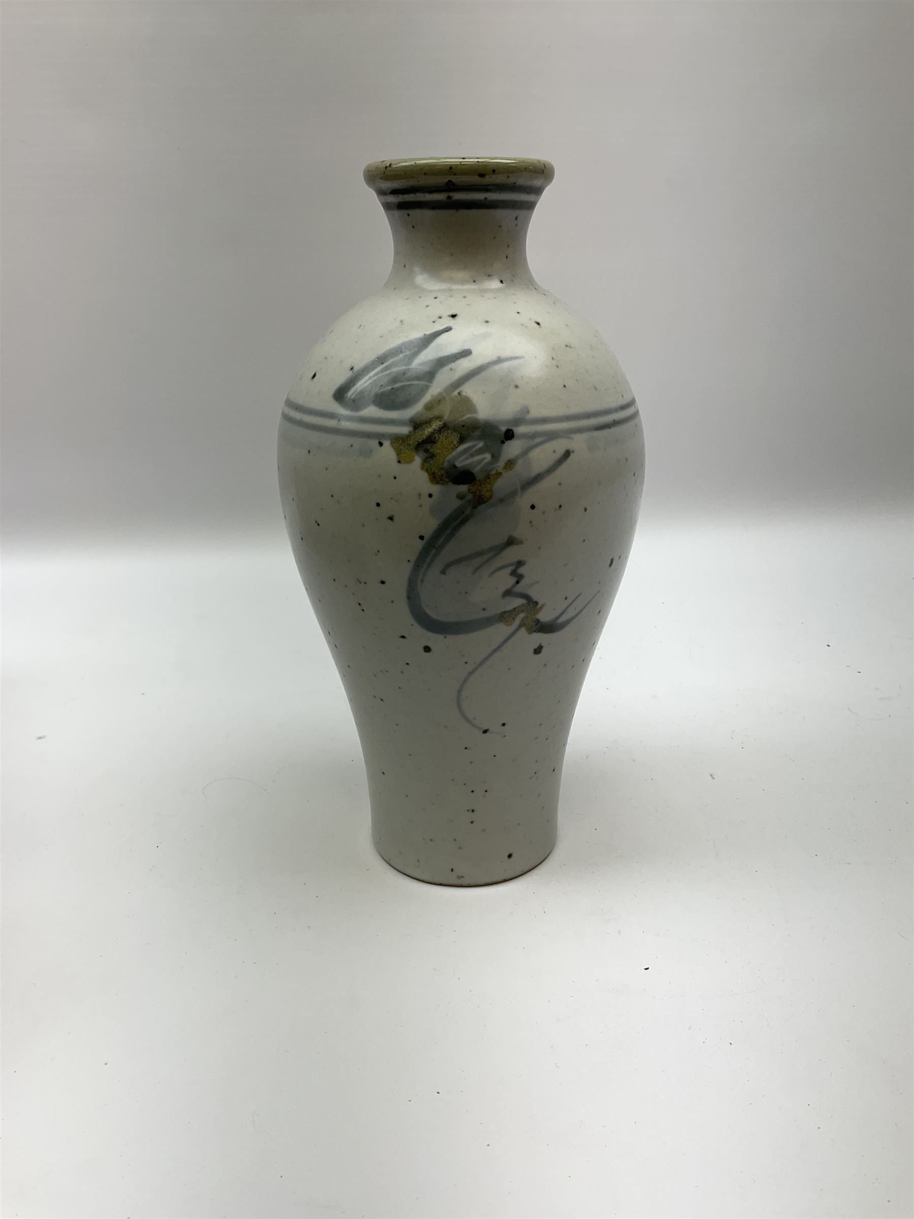 Studio pottery vase of baluster form with a light mottled blue ground with abstract painted decoration, H26cm