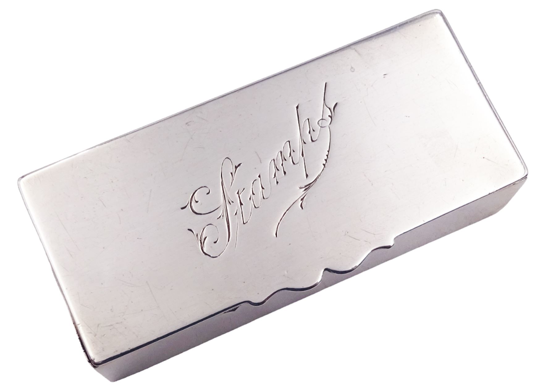 Late Victorian silver stamp box, of plain rectangular form, the hinged cover engraved 'Stamps', opening to reveal a gilt interior, hallmarked Mappin Brothers, Chester 1900, L7.5cm, approximate weight 1.89 ozt (58.8 grams)