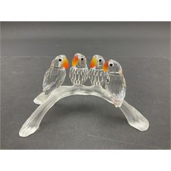 Four Swarovski Crystal bird figures, comprising Cockatoo, pair of Hoopoes on a branch, four Lovebirds on a branch and four Hummingbirds on a branch, largest H10cm