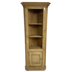 20th century pine floor-standing corner cupboard, fitted with shelves and panelled cupboard 
