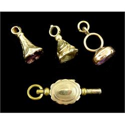 Three Victorian gold mounted seal fobs and a gold mounted watch key (4)