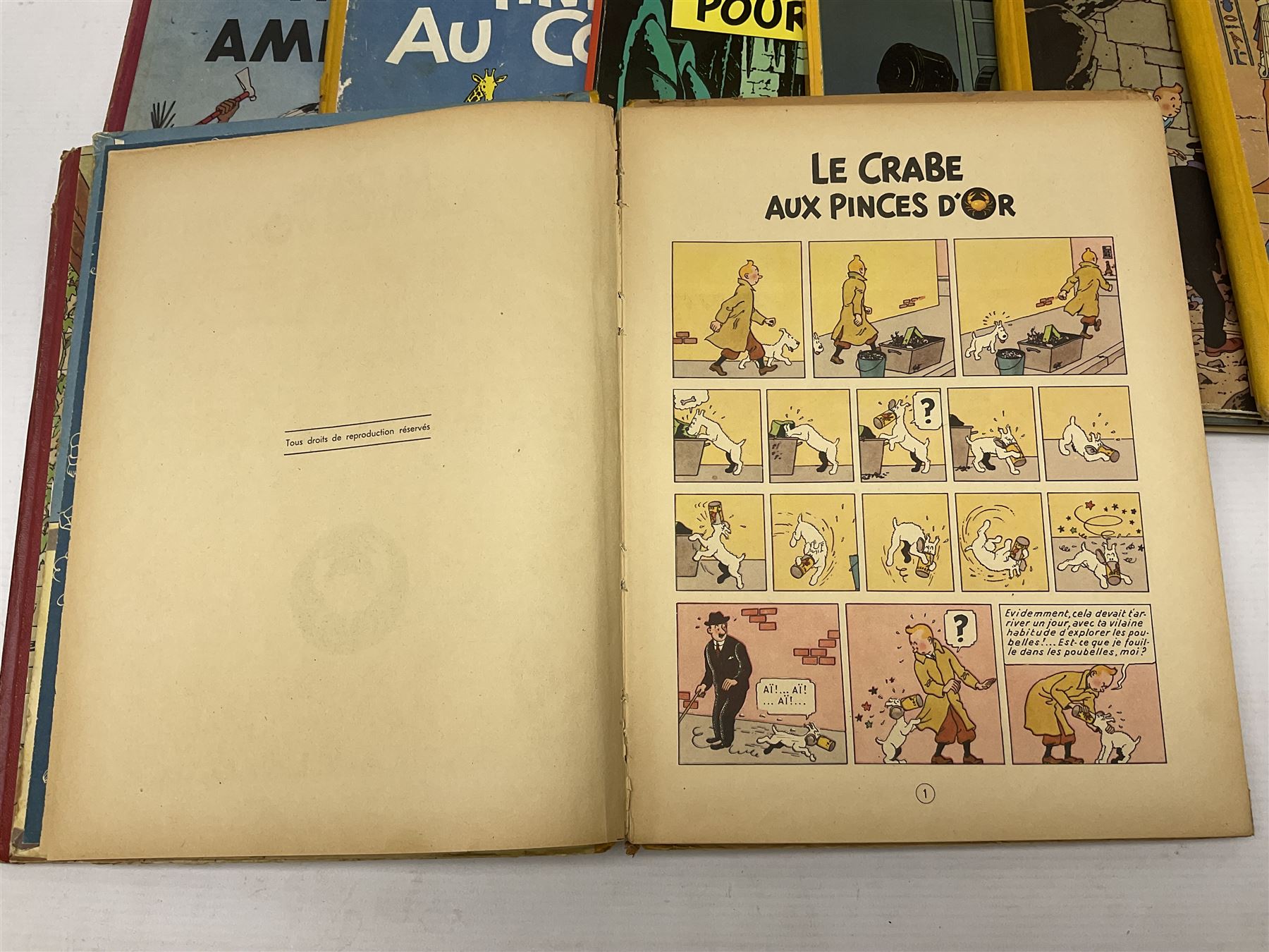 Twenty one first edition Herge, 'The Adventures of Tin Tin' books published by Casterman Bruxelles, with French text and coloured comic strip illustrations throughout; comprising Tintin Au Congo 1946, Tintin En Amerique 1946, Les Cigares du Pharaon 1955, Le Lotus Bleu 1946, L'Oreille Cassee 1943, L'ile Noire 1943, Le Sceptre d O'ttokar 1947, Le Crabe Aux Pinces D'or 1943, L'Etoile Mysterieuse 1942, Le Secret de la Licorne 1943, Le Tresors de Rackan Le Rouge 1945, Les 7 Boules de Cristal 1948, Le Temple du Soleil 1949, Au Pays de L'Or Noir 1950, Objectif Lune 1953, On a Marche sur la Lune 1954, L'Affaire Tournesol 1956, Coke en Stock 1958, Tintin au Tibet 1960, Les Bijous de la Castafiore 1963 and Vol 714 Pour Sydney 1968
