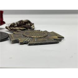 WW2 German Eastern Front Medal awarded to those who served on the German Eastern/Russian Front during the Winter Campaign period of 15th November 1941 to 15th April 1942 with original ribbon; German War Merit Cross with swords; and NSDAP Long Service Award (3)