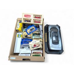 Maisto Jaguar XJ220 model car on stand and a collection of diecast model vehicles, includi...