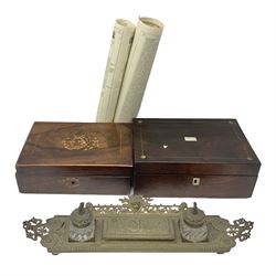 Two mahogany boxes, the first example with mother of pearl inlay and the second with marquetry details, together with a cast brass inkstand with two glass inkwells and four reproduction maps of England 