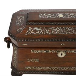 Tea caddy of sarcophagus form, inlaid with mother of pearl decoration,  the hinged lid opening to reveal two covered compartments, H24cm 