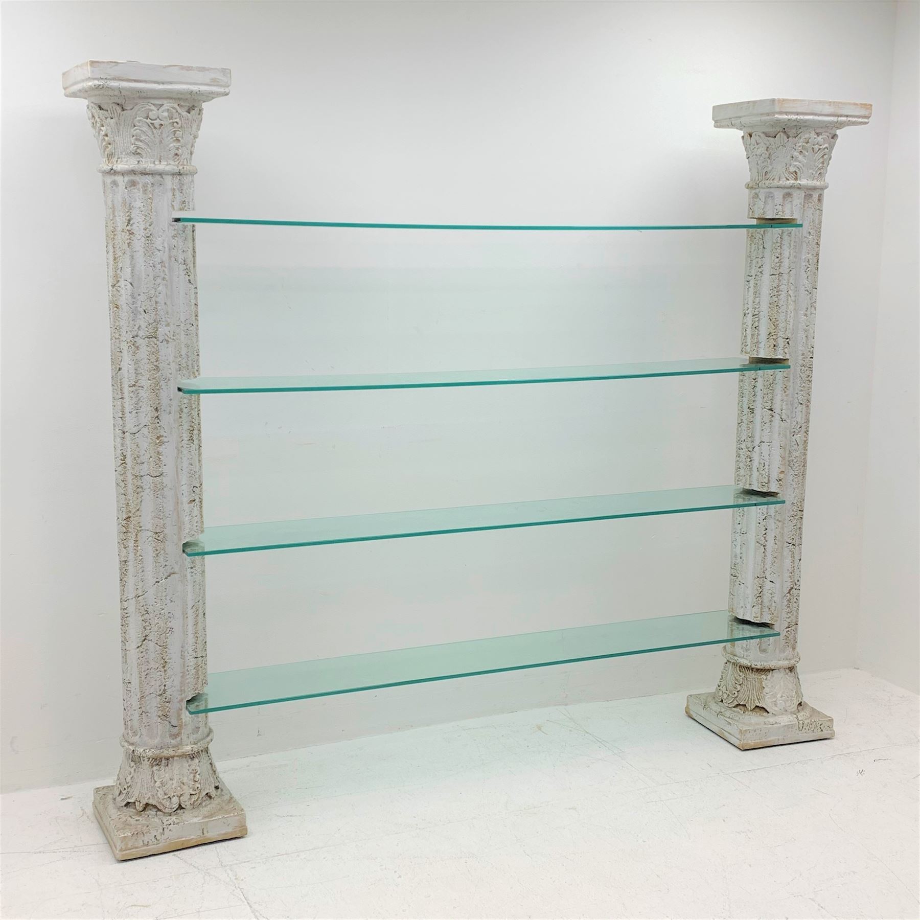 Architectural four shelf glass shelving unit supported by two Corinthian columns, W205cm, H179cm, D30cm
