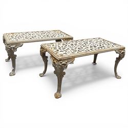 Pair of cast iron low garden tables with rams head legs in a white finish