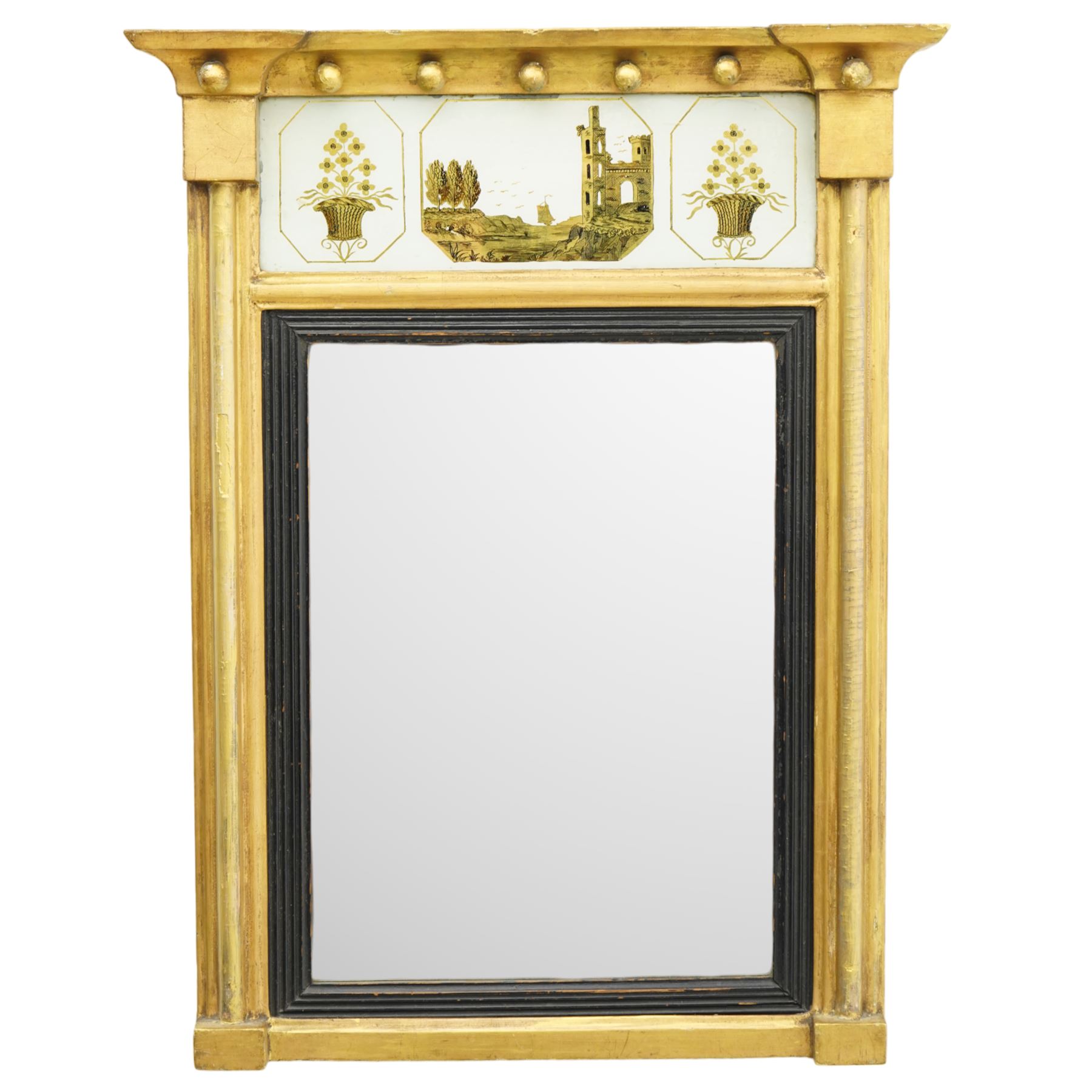 Regency giltwood pier mirror, projecting moulded cornice with ball mounts, the glazed frieze decorated with coastal ship and castle scene and flanked by to floral baskets, ebonised reeded slip enclosing bevelled mirror plate