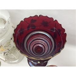 Bohemian red glass lustre, painted with stylised floral and foliate decoration, together with a milk glass example and two bohemian goblets converted to lustres 