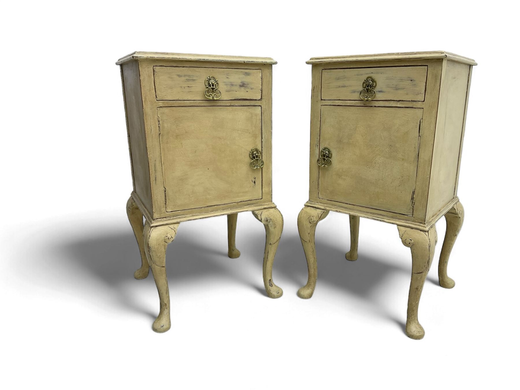 Pair of mid-20th century cream painted bedside cabinets, rectangular top over single drawer and cupboard, on cabriole supports