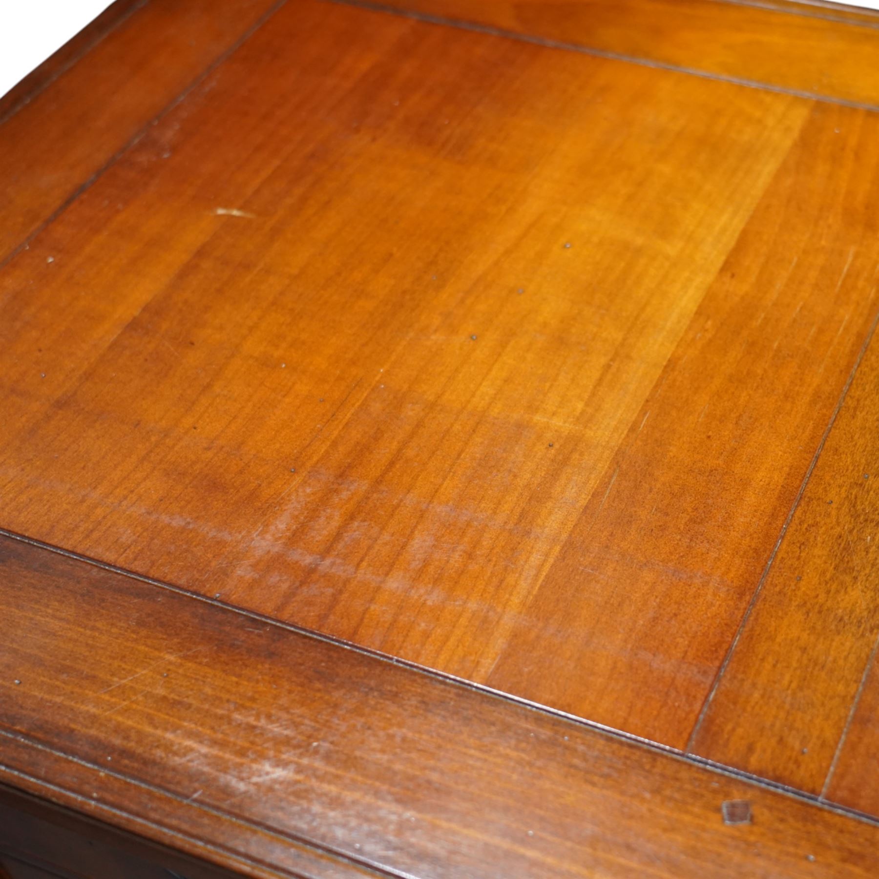 And So To Bed - French cherry wood twin pedestal dressing table, the rectangular top over seven drawers arranged with a central drawer and three drawers to each pedestal, panelled sides with louvred detail, raised on turned bun feet
