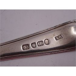 George II silver Hanoverian pattern table spoon, with rattail bowl and engraved with initials BV to terminal verso, hallmarked London 1730, makers mark IH or IK, possible Jeremiah King or John Hopkins, together with two George III silver Old English pattern table spoons, the first example with reed border, hallmarked Stephen Adams II, London 1787, the second example hallmarked London 1800, maker's mark indistinct