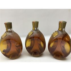 Four bottles of Haig's Dimple Old Blended Scotch whisky, all 26 2/3 Fl.OZs, 70 proof, one in original box and a bottle of East India 1961, Madeira, unknown contents and proof