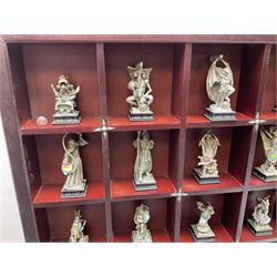 Danbury Mint 'The Fantasy of the Crystal' chess set consisting of mythical pewter chess pieces within a wooden case with chess board lid, together with 16 additional chess pieces in a wooden display case.