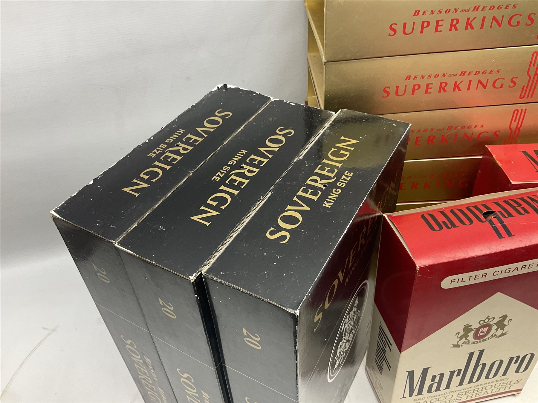 Thirteen oversized promotional shop display cigarette boxes, advertising various brands comprising Malboro, Benson and Hedges Superkings, Sovereign and Special Filter, tallest H48cm