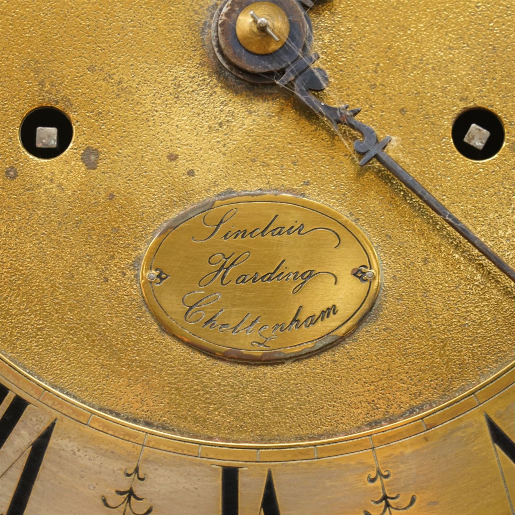 Mouseman - mid-20th century oak longcase clock, with a high quality weight driven movement and dial by Sinclair and Harding & Co of Cheltenham, the rectangular hood carved with foliate ornament, over a glazed and oak trunk on stepped base, with carved mouse signature, by the workshop of Robert Thompson of Kilburn Provenance: purchased directly from the Kilburn workshop in the 1940s/1950s