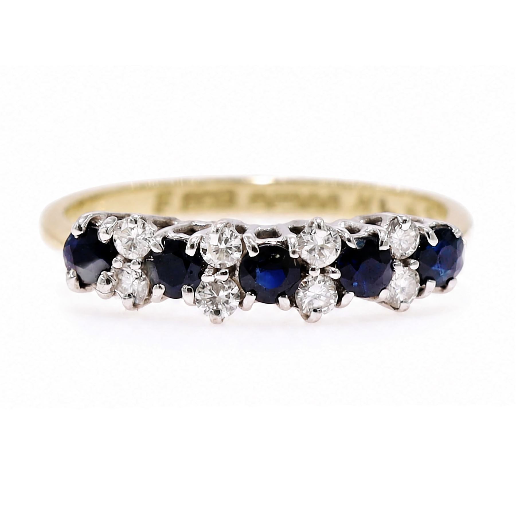18ct gold sapphire and diamond ring, five round cut sapphires, spaced by two two round round brilliant cut diamonds, Birmingham 1983, total diamond weight approx 0.25 carat