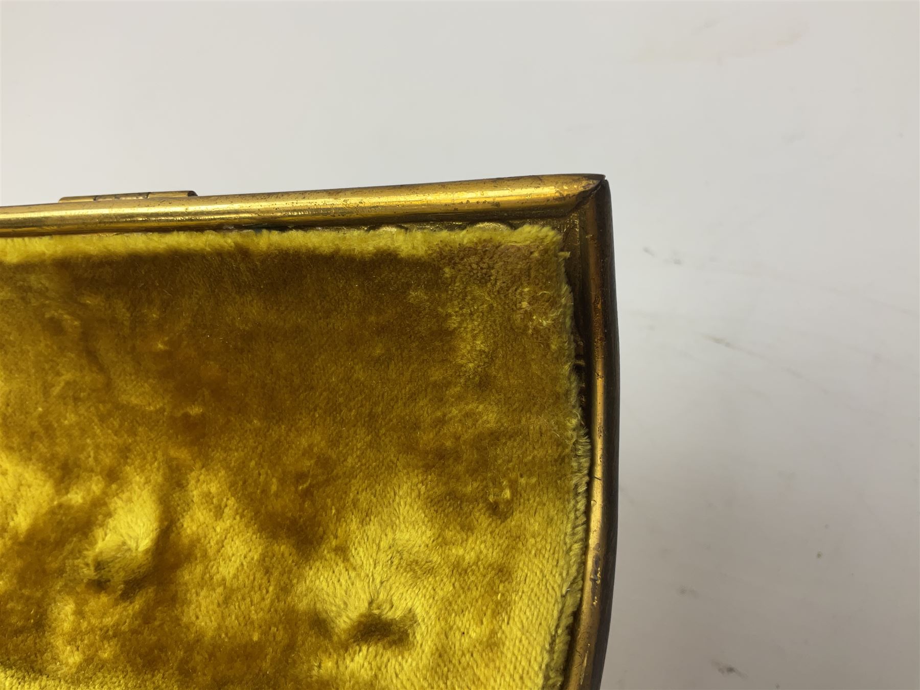 19th century brass repoussé perfume box, the ornately decorated casket with hinged domed cover lifting to reveal gold velvet lined interior containing three glass scent bottles, H14cm W15cm D7cm