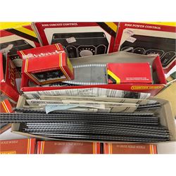 Hornby '00' gauge - six passenger coaches and nine goods wagons; two R902 and one R900 controllers; all boxed; Dublo level crossing; quantity of track; catalogues etc