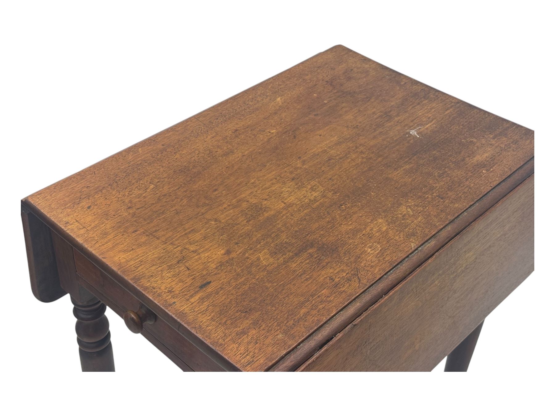 Georgian design mahogany drop-leaf table, rectangular top above a single drawer with brass handle, square supports united by arched undertier, on brass castors (W62cm, D65cm, H72cm); and a smaller mahogany drop-leaf table with single drawer on turned supports (W43cm, D61cm, H72cm)