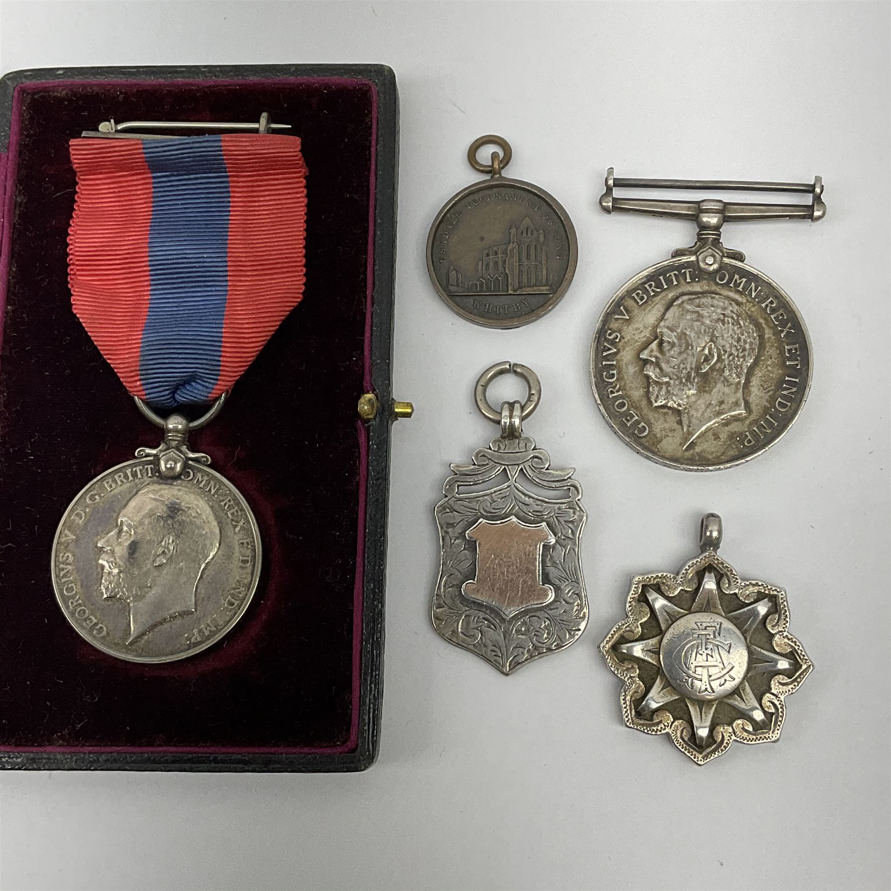 George V Imperial Service Medal awarded to Arthur Poulter, cased; and two Victorian silver sporting fobs inscribed A. Poulter and dated 1896 and 1898; together with WW1 British War Medal awarded to R4-068401 Pte. R. Burnett A.S.C.; and an uninscribed bronze singing medallion (5)