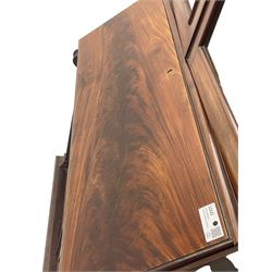 Early 19th century figured mahogany bureau bookcase, projecting splay moulded cornice over three adjustable shelves enclosed by two glazed doors, fall front revealing pigeonholes, cupboard and drawers, pull-out strays with scroll carved terminals, double cupboard with two panelled doors, on turned feet 