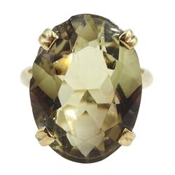 Gold oval smokey quartz ring, stamped 9.375