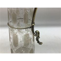Late 19th century cut glass and silver plated mounted claret jug, the body of tapering form heavily decorated, with star cut base, H31cm, together with another later silver-plate mounted claret jug
