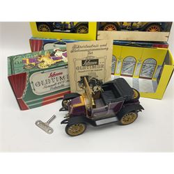 Schuco - four boxed Old Timer series tin-plate model cars comprising two 1228 Opel Doktor-Wagen 1909, one in yellow and another in blue, 1229 Mercedes Simplex anno 1902, and 1230 Renault 6CV/1911 Voiturette 