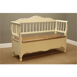  Laura Ashley rustic cream painted and mahogany bench, shaped spindle back, hinged seat, W136cm, H93cm, D47cm  