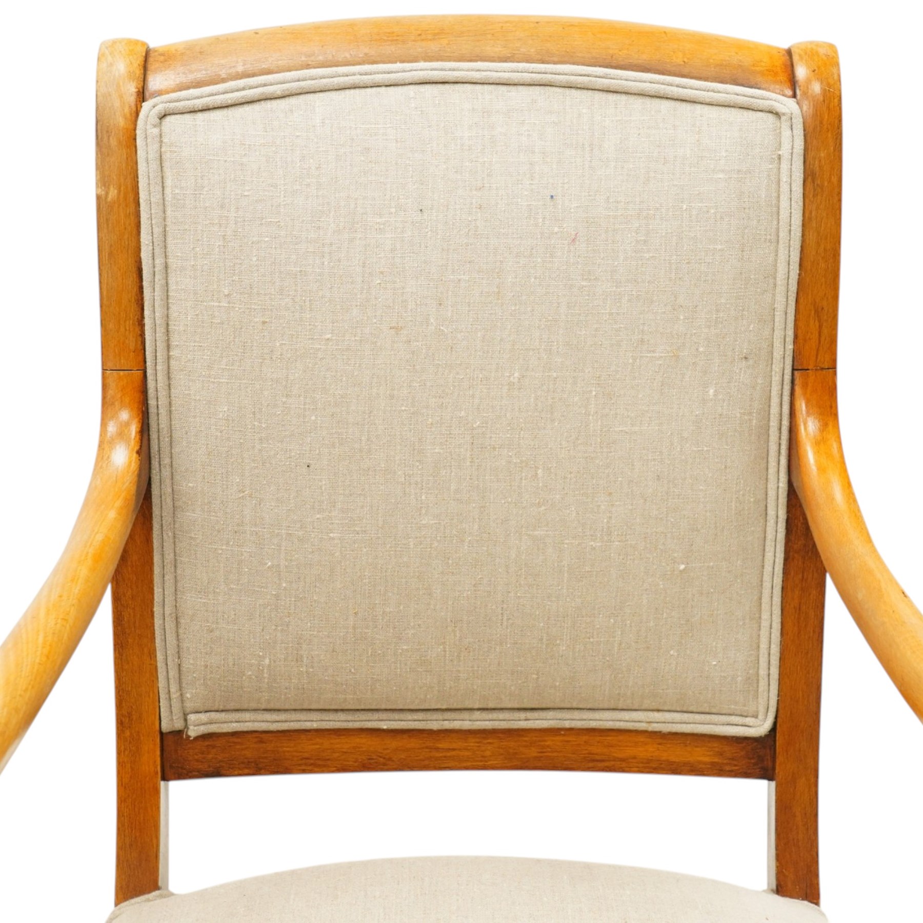 Pair of French Empire design fauteuil armchairs, high back over scrolled arm terminals, upholstered in cream fabric, on scroll carved cabriole supports