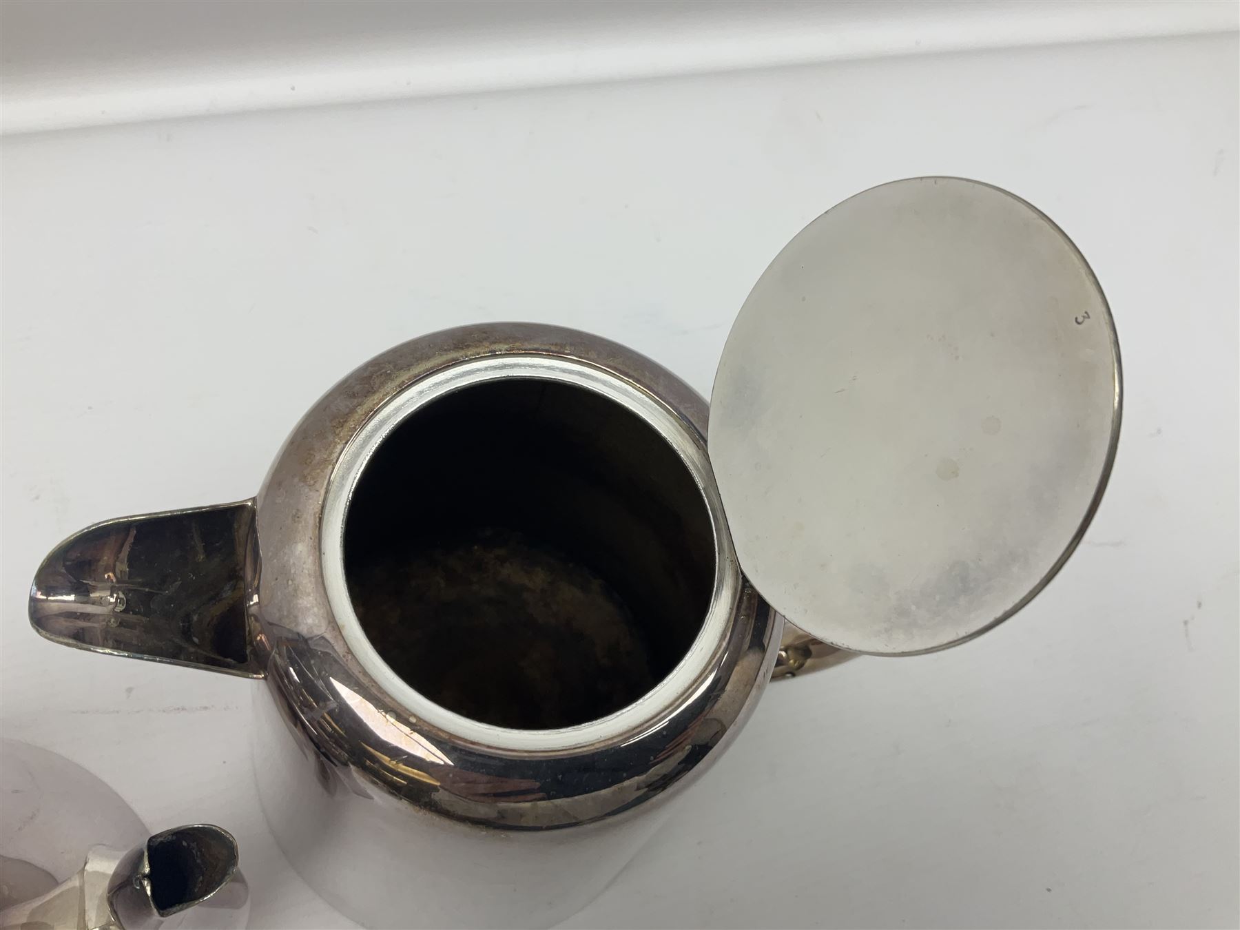 EPNS four piece tea service, comprising teapot, coffee pot, sugar bowl and milk jug