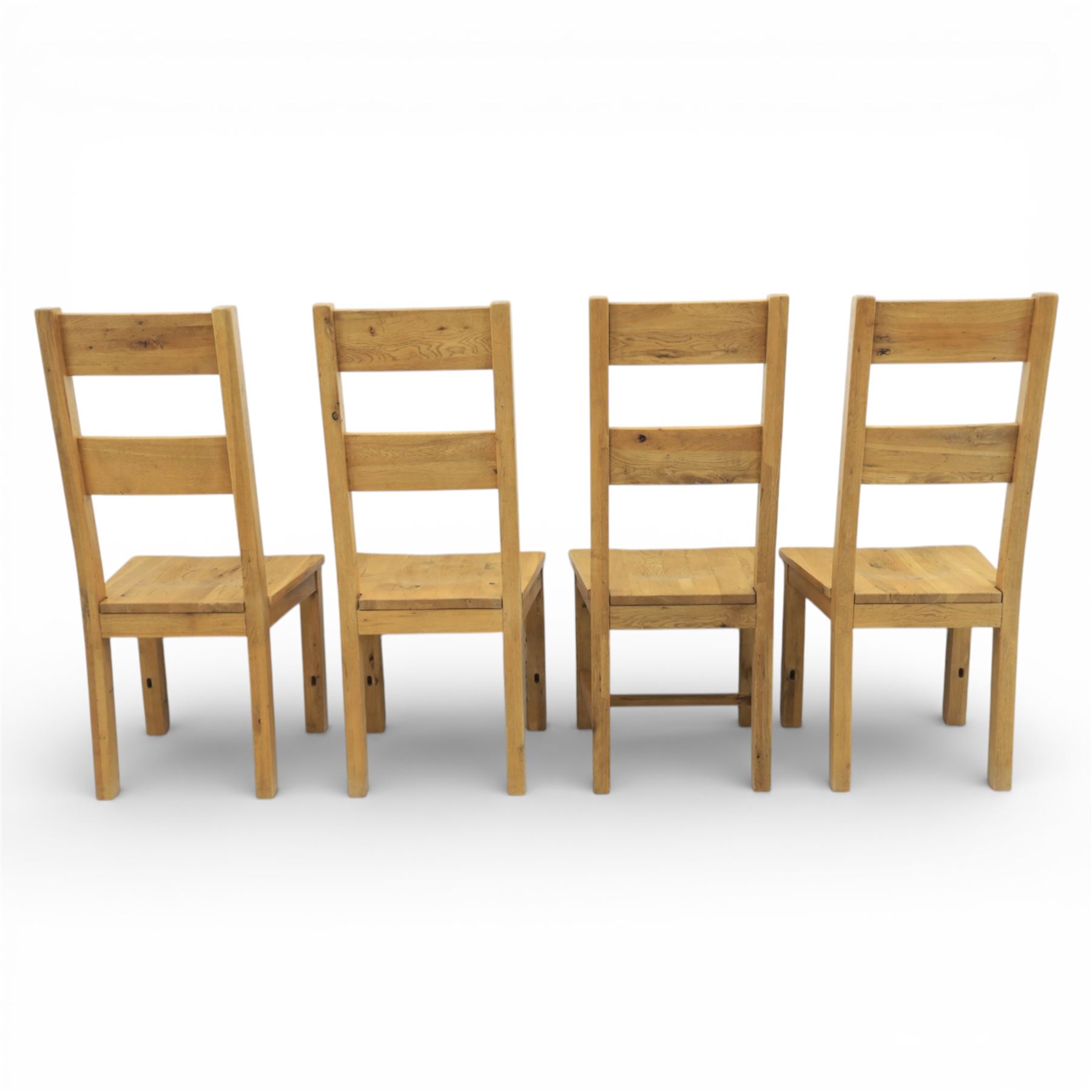 Modern light oak rectangular dining table, and eight high back chairs, stowable leaves extending to 270cm