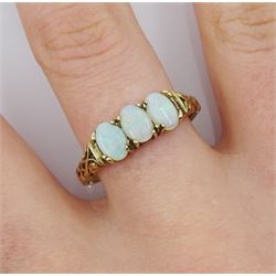 9ct gold three stone oval opal ring, hallmarked