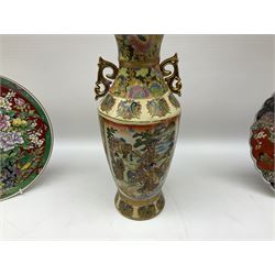 Japanese Satsuma vase of baluster form, the body with two panels decorated with scenes containing elders within border of floral and geometric motifs, with gilt detail throughout, H20cm, together with a larger twin handled vase decorated with panels of geisha in a mountainous riverscape within floral borders, H35cm, further Imari plate with scalloped edge, Victorian oriental style green vase and plate ornately decorated with peonies and exotic bird (5)
