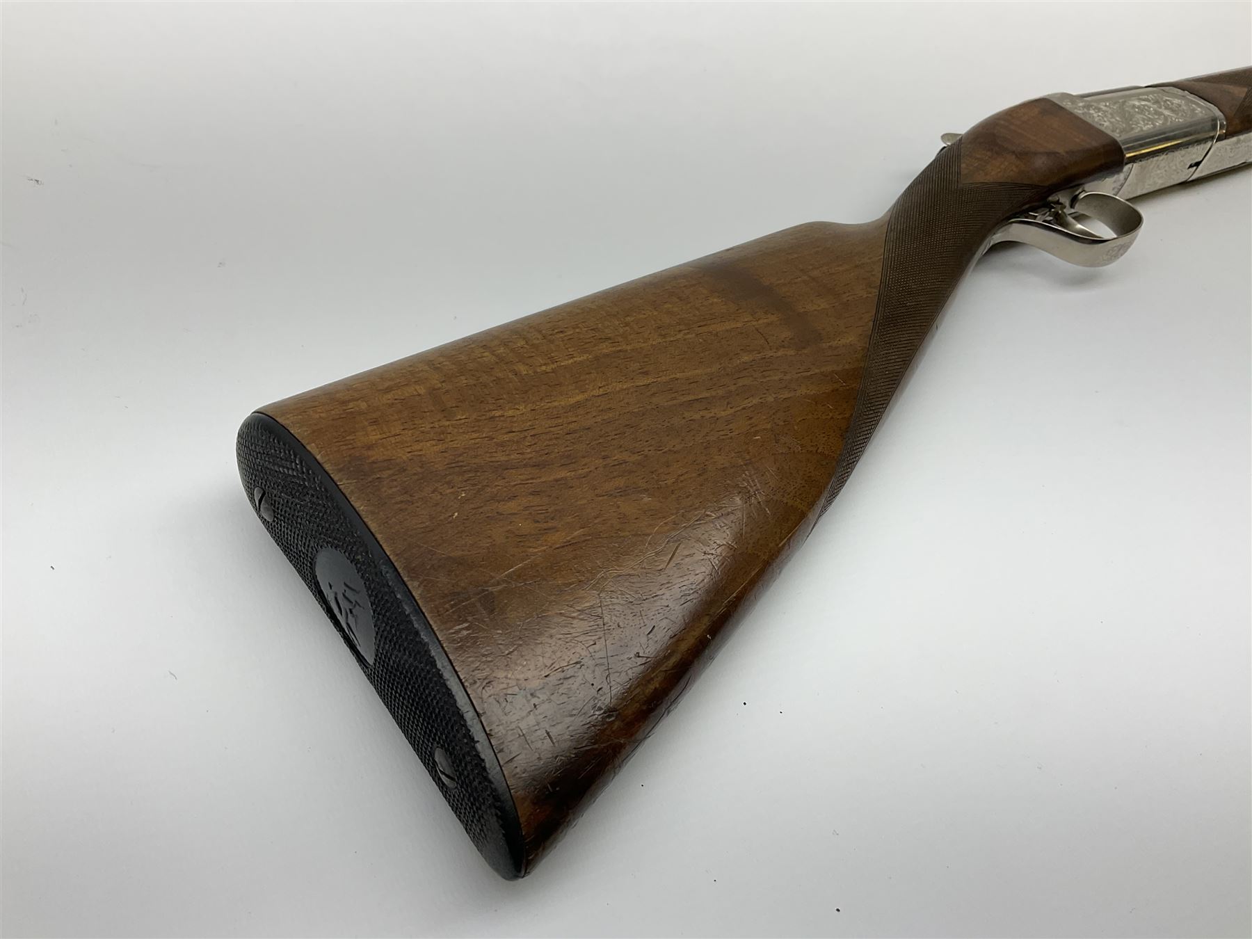 French Verney Carron 12-bore over-and-under double barrel boxlock ejector sporting gun, 71cm barrels, walnut stock with chequered grip and fore-end and thumb safety, serial no.336224X, L115cm RFD ONLY AS BARRELS MARGINALLY IN PROOF