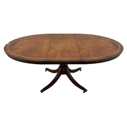 Georgian design oval mahogany extending dining table, with extra leaf, single pedestal base, inlaid detail