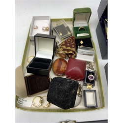 A collection of vintage and later costume jewellery including brooches, earrings, and rings, together with a quantity of ladies wrist watches. 