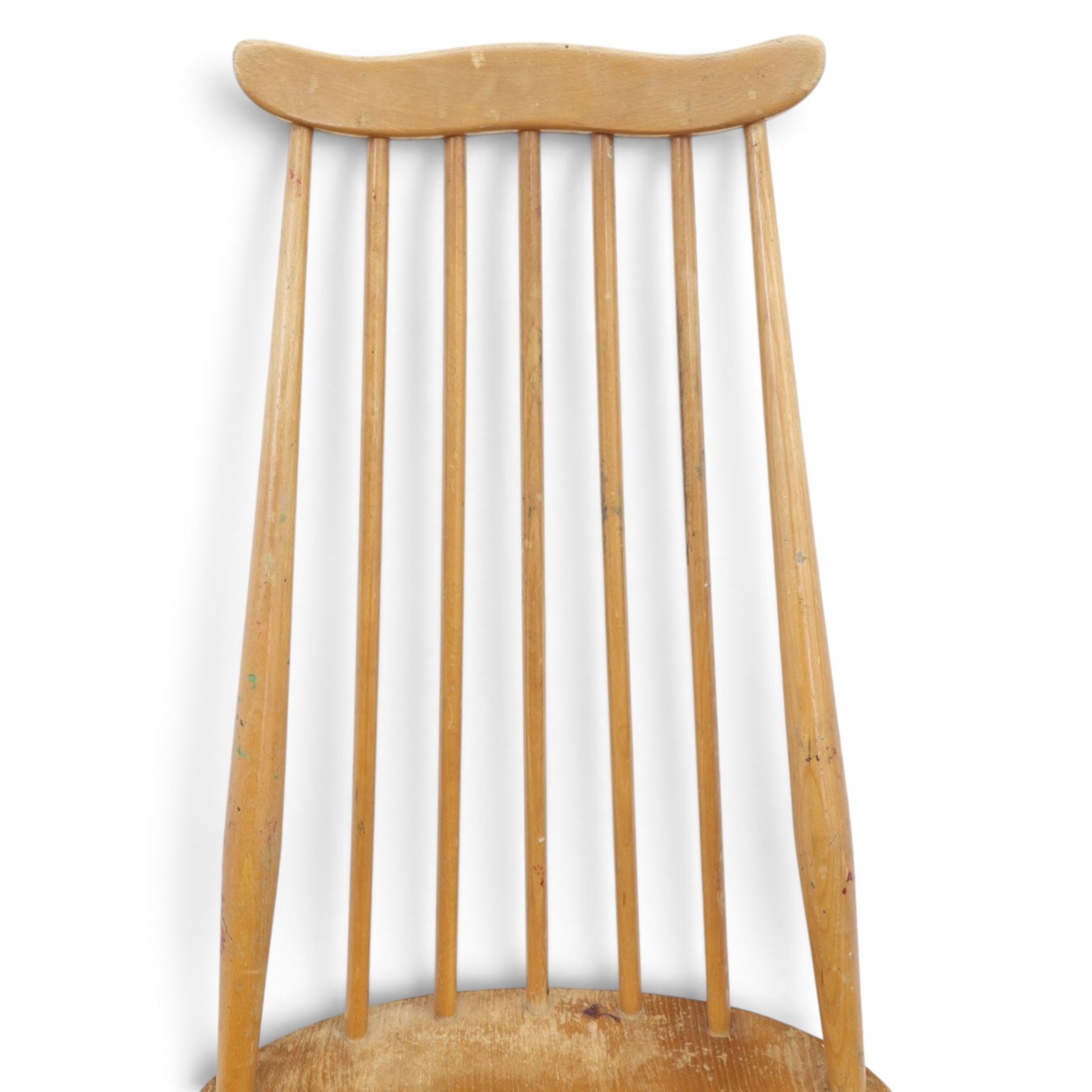 Ercol - 'Goldsmith' light elm set of four dining chairs, shaped cresting rail above seven spindles, dished seat raised on tapering supports with H-stretcher