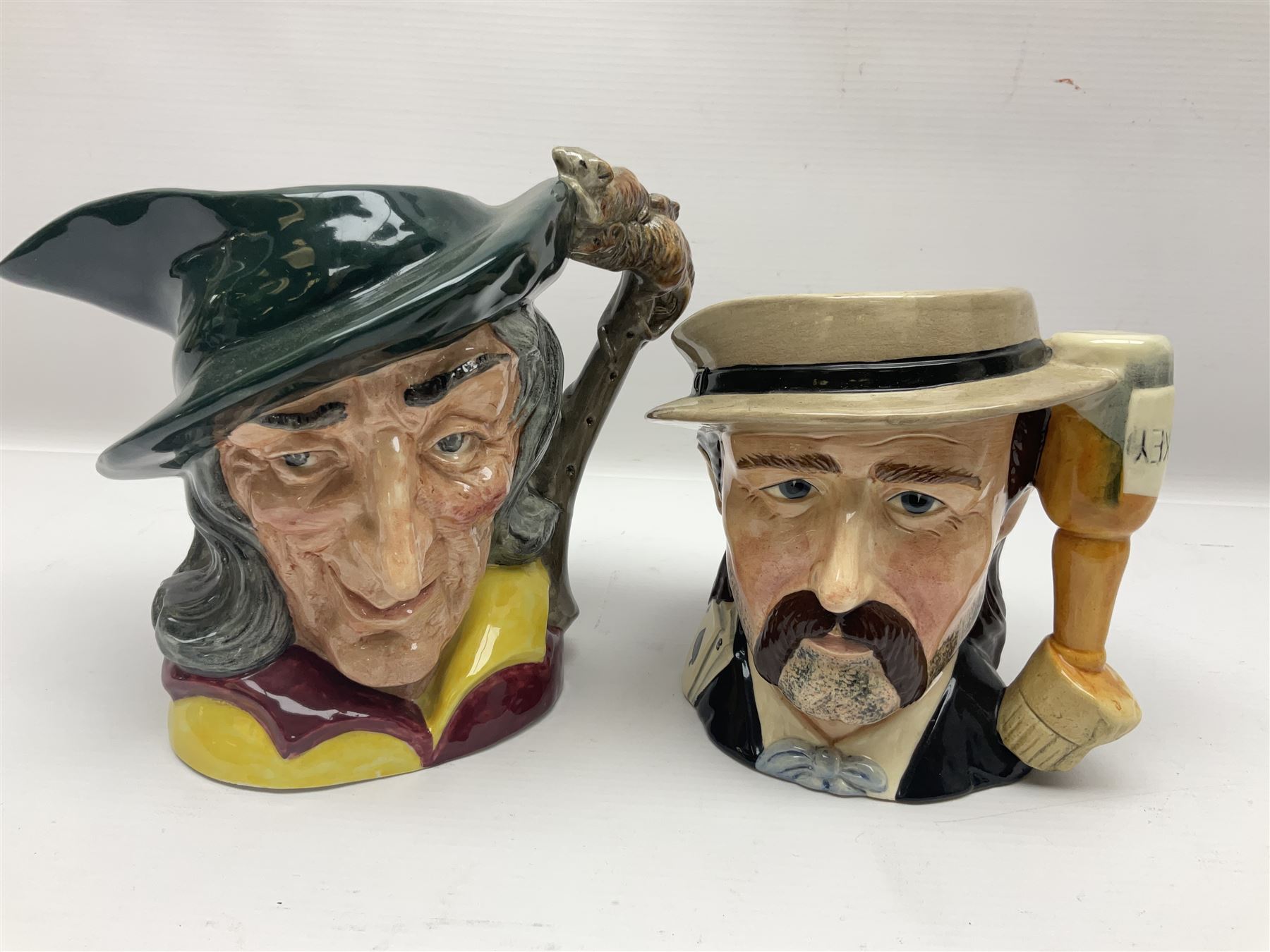 Large collection of Royal Doulton character jugs, to include Robinson Crusoe D6532, Tam O Shanter D6632, The Falconer D6533 etc, together with similar charater jugs and toby jugs   