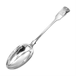  Victorian Newcastle silver Fiddle Shell pattern serving spoon, the terminal engraved with crest of a fist holding an arrow aloft, hallmarked Lister & Sons, Newcastle 1862, L31cm