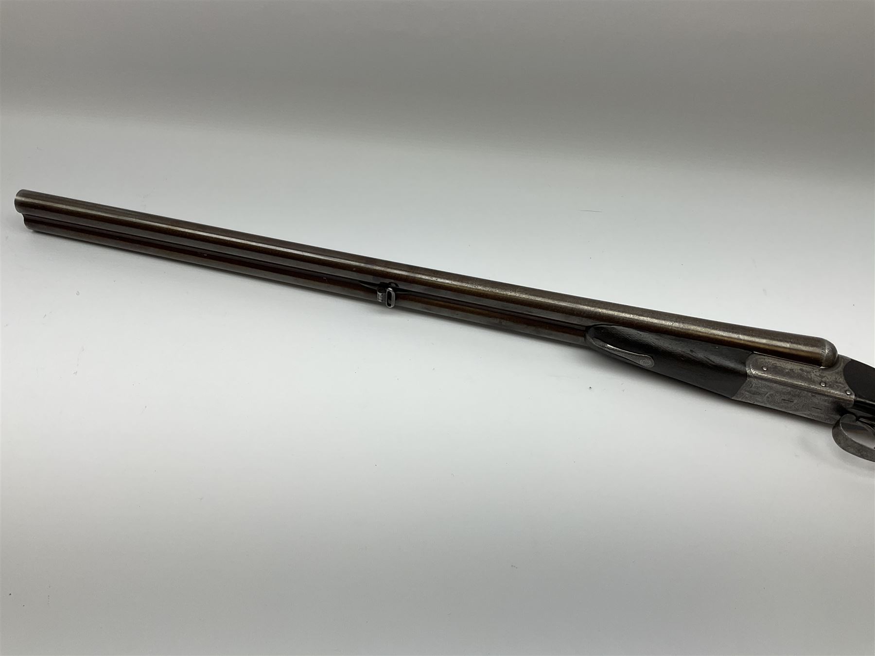 Lincoln Jeffries 12-bore side-by-side double barrel lightweight boxlock non-ejector sporting gun,  out-of-proof 66cm damascus barrels with sunken ribs, profusely engraved action, Prince of Wales walnut stock with chequered pistol grip and fore-end and thumb safety, sling swivels under barrel and stock, serial no.2139(?), L107.5cm overall RFD ONLY