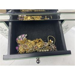 Large collection of costume jewellery including beaded necklaces, earrings, pendant necklaces, rings and wristwatches in glass mounted four drawer jewellery chest